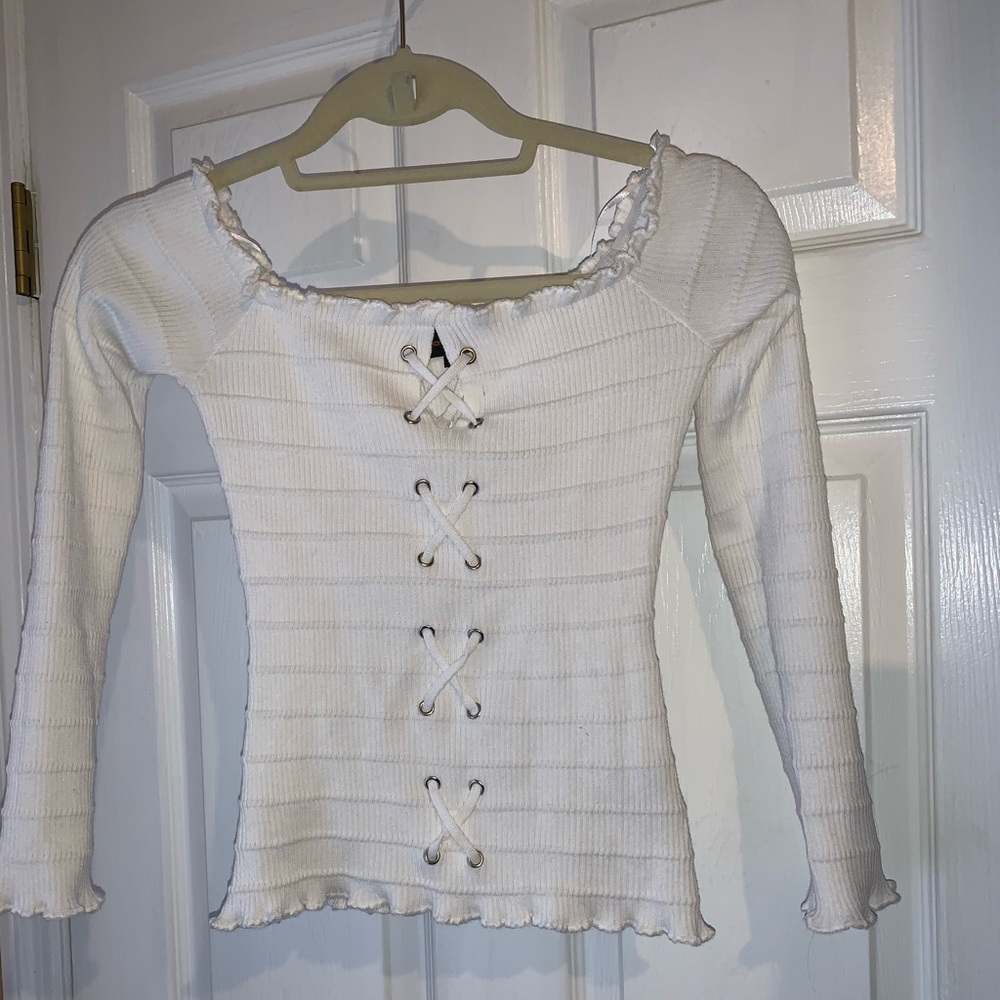 White long sleeve off the shoulder shirt